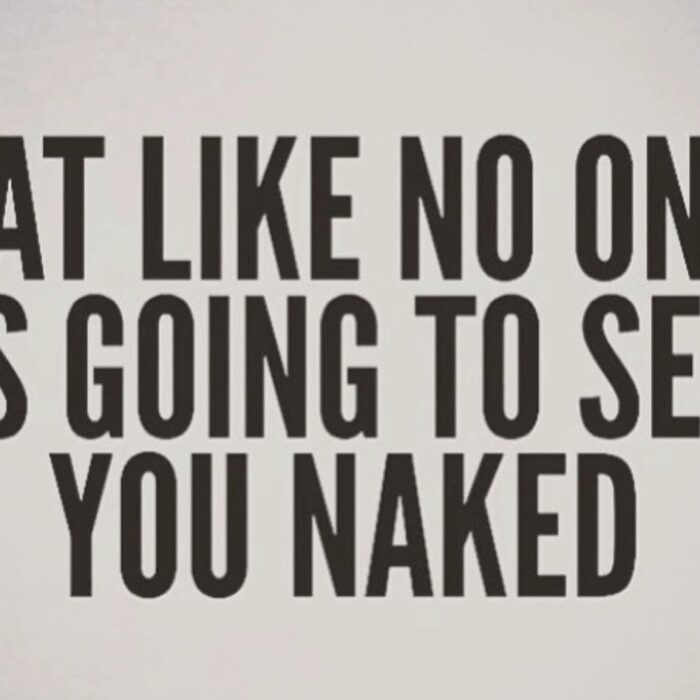 Inspirational text on a wall about living freely and authentically.